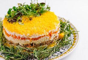 Festive layered salad with elegant garnish photo