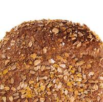 Loaf of fresh baked multigrain bread photo