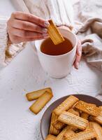 Cozy tea time with cookies photo