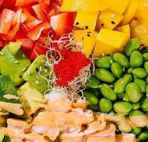 Fresh shrimps and avocado salad bowl photo