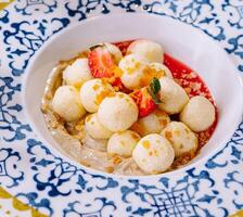 Elegant fruit salad in decorative bowl photo