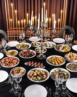 Elegant banquet table setting with candelabra photo