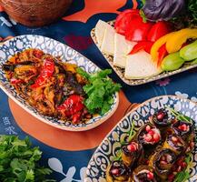 Vibrant spread of mediterranean dishes with fresh vegetables and herbs photo
