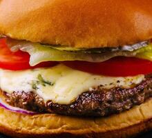 Delicious cheeseburger close up photo