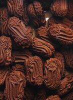 Box of chocolate cookies close up background photo