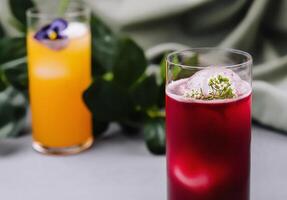 Refreshing red cocktail with citrus juice background photo