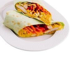 Fresh chicken wrap on white plate photo