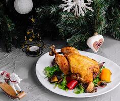 Festive holiday roast chicken dinner photo