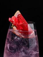 Elegant pink cocktail with grapefruit garnish photo