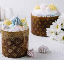 Artisanal easter cakes with colorful meringue toppings photo