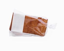 Sliced bread in transparent packaging isolated on white photo