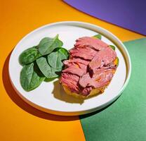 Colorful roast beef and spinach salad photo