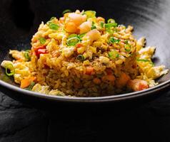 Delicious fried rice in bowl photo