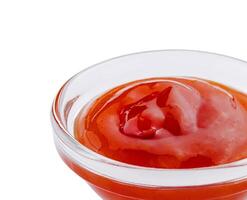 Fresh tomato ketchup in glass bowl photo