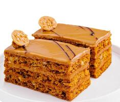 Gourmet peanut butter cake slices on white plate photo