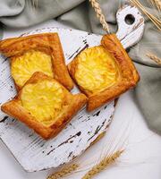 Blank box with homemade cheese tarts photo