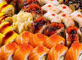 Assorted sushi platter close up background photo