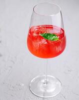 Refreshing summer cocktail with mint garnish photo