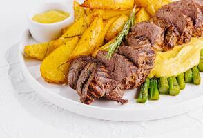 Succulent roast beef dinner with sides photo