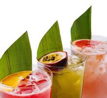 Trio of tropical cocktails with exotic garnishes photo
