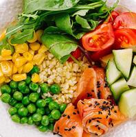 Fresh salmon poke bowl macro background photo