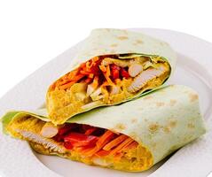 Fresh chicken wrap on white plate photo