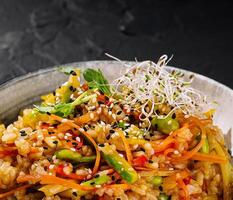 Colorful asian fusion rice bowl photo