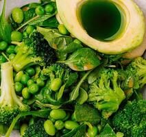 Fresh green vegetarian bowl with avocado and broccoli photo