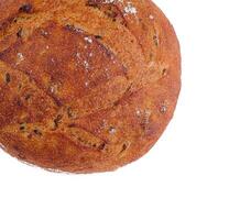 Artisanal round rye bread isolated on white photo