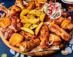 Succulent grilled chicken and potato feast photo