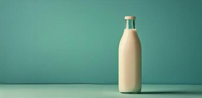 Bottle of Milk on Blue Background photo