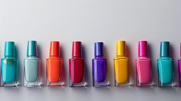 Row of Different Colored Nail Polish Bottles photo