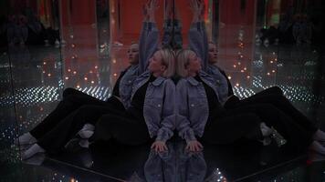 Confident Female Person Moving Inside Hall of Mirrors Seeing Self Reflection video