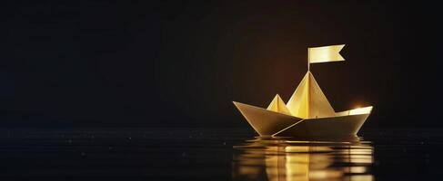 Yellow Origami Boat Floating on Water photo