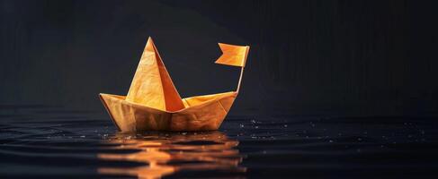 amarillo origami barco flotante en agua foto