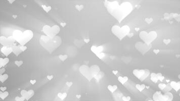 Glowing tender beautiful cute flying love hearts on a black and white background for Valentine's Day video