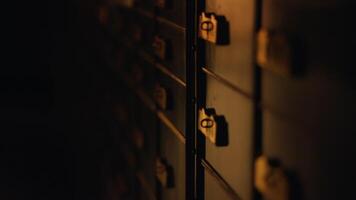 a close up of a row of lockers in a dark room video