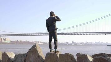 Male Person Walking Over Stone Rocks Overcoming Obstacles and Succeed video