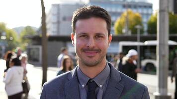 Lifestyle Portrait of Young Handsome Man in Suit Looking at Camera video