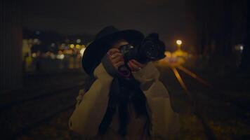 Professional Female Photographer Using DSLR Camera Capturing Photos video