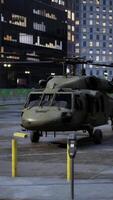 military helicopter in big city video