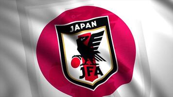 Football logo on flag of country. Motion. Beautiful emblem of football team on flag of country. Waving flag of Japanese football team video