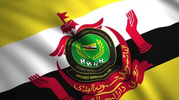 Diagonal view of waving colorful flag of Football Association of Brunei Darussalam. Motion. Realistic contrasting flag fluttering in the wind, seamless loop. For editorial use only. video