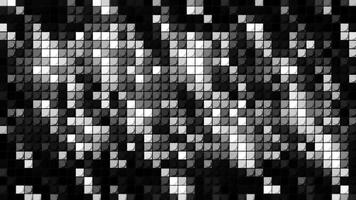 Abstract monochrome shimmering mosaic background, seamless loop. Motion. Black and white blinking wall of square shining shapes. video