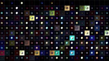 Audio equalizer on dark background, beating rings. seamless loop. Motion. Music or sound equalizer in blinking circles inside rows of squares. video