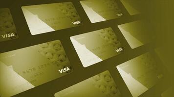 Credit card symbols floating in many rows. Motion. Golden beautiful design of modern credit cards, concept of online shopping. video