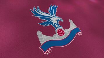 Abstract eagle on the purple, blue, and white emblem of the Crystal Palace professional football club. Motion. Waving flag of sports club. For editorial use only. video