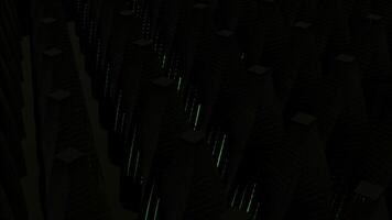 Dark pattern with many long 3D objects covered by neon moving lines. Design. Rows of cone figures with flat cut tops spinning on a black background. video