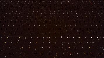 Abstract digital lines randomly moving among spots in a dark technological space. Animation. Flowing narrow stripes in a grid, seamless loop. video