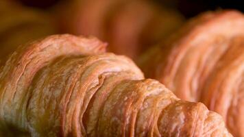 croissant on a white table, natural ingredients, delicious, sweet and appetizing food. video